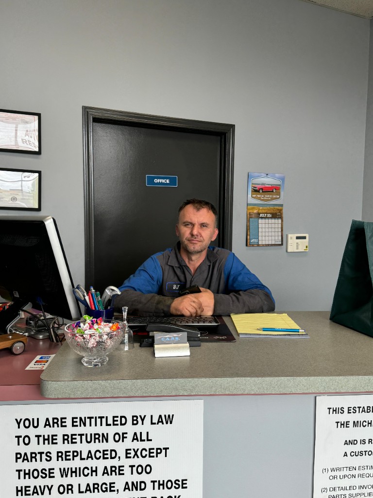 C.A.R.S. team member at front desk